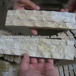Yellow chiselled marble-