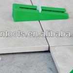 Tile Leveling System, Lippage leveling spacer and cap wedges-