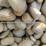 landscaping Yellow stone pebbles