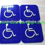 plexiglass braille disable sign