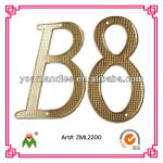 Brass apartment door numbers