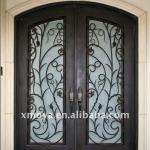 Eyebrow arch wrought iron door