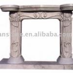White carved marble fireplace mantel