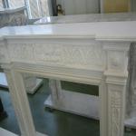 white marble stone fireplace
