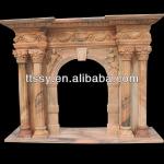 Indoor marble column fireplace mantel