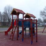 Rubber cover for playgrounds