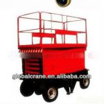 Mobile electric trailer scissor lift of tractor type