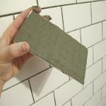 Additives based adhesives for fixing tiles