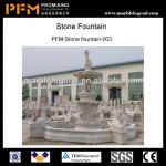 Big white stone marble fountain with roman scuptures