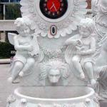 White marble lion head stone wall fountain with child angels